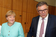 Bundeskanzlerin Angela Merkel und komba nrw Landesvorsitzender Andreas Hemsing. © Eduard N. Fiegel / photofiegel.de
